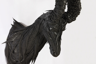 Illustration for article titled This Artist Turns Old Tires Into Dark, Disturbing Nightmare Monsters